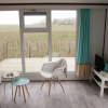 Отель Comfy Chalet With Dishwasher, Near the Wadden Sea, фото 9