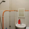 Отель Kost Harmoni by RedDoorz, фото 10