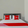 Отель OYO 90809 Homestay Black Pink Merah Jambu Syariah, фото 6