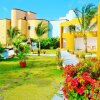 Отель Arrecifes Suites в Пуэрто-Морелосе