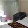 Отель Jindi Business Hotel в Хулун-Буире