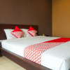 Отель OYO 311 Melody Guest House, фото 1