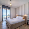 Отель Stylish 1BR Beach-Front Apt w Sea View, фото 2