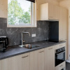 Отель Cleverly decorated tiny house, on a holiday park 1 km. from the beach, фото 17