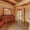 Отель Executive Plus 89 - Luxurious log Home With Private hot tub Pool Sauna and Close to Activities, фото 9