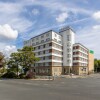 Отель Trip Inn Living & Suites, фото 1