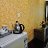 Отель Xinming Sunshine Hotel Apartment, фото 6