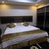 Отель Moon City Furnished Units, фото 7