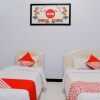 Отель OYO 421 Alianda Guest House Syariah, фото 6