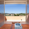 Отель Porto Coda Cavallo Beach House a 300 mt dal mare, con terrazza panoramica, фото 1