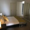 Отель Melbourne Short Stay Apartments at Melbourne CBD, фото 6