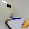 Отель SPOT ON 90577 Griya Afifah Syariah, фото 13