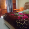 Отель Penginapan Kamuna Garden 3, фото 3