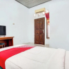 Отель Wisma Amalia Syariah by OYO Rooms, фото 26