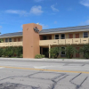 Отель Curtis Inn & Suites, фото 1