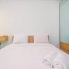 Отель Modern Studio with City View at Tamansari Mahogany Apartment, фото 8
