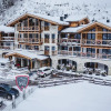 Отель AvenidA Mountain Lodges Saalbach, фото 1
