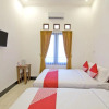 Отель OYO 931 Dara Dewi Homestay, фото 7