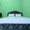 Отель OYO 93411 Syariah Hotel Tomborang, фото 6