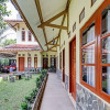 Отель Collection O 90461 Graha Atmadja Syariah Guest House, фото 19