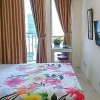 Отель Apartment Sentra Timur Tower Tower Orange Cheap Inn RedPartner, фото 4