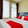 Отель OYO 90266 Jarrdin Apartement By Bedpacker, фото 8