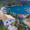 Отель Irena Walk to Beach Sea Views A C Wifi Car Not Required - 244, фото 21