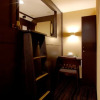 Отель Capsule Cabin Petit Nagoya - Men Only, фото 3
