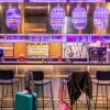 Отель Moxy Berlin Airport, A Marriott Hotel в Waltersdorf