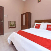 Отель Nurbayu Guest House by Oyo Rooms, фото 1