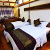 Отель Lijiang Yiran Ethnic custom Viewing Inn, фото 11