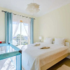 Отель Sea view Apartment with sunbathing Terrace & 2 Swimming pools, фото 3