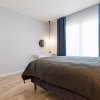 Отель Central apartments, Quiet with Free Parking and AC., фото 5