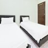 Отель Oyo 90596 Casaria Inn, фото 8