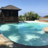 Отель Bungalow With one Bedroom in Ruisseau, With Wonderful sea View, Pool A, фото 3