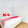 Отель OYO 1906 Zhafira Guest House Syariah, фото 9