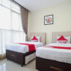 Отель OYO 1241 Eirini Family Homestay, фото 7