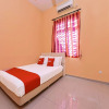 Отель OYO Home 90532 Casa Azlinda Muslim, фото 3