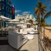 Отель The Tryst Beachfront Hotel в Сантурсе