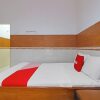 Отель OYO 92533 Harjuna Guest House, фото 4
