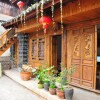 Отель Lijiang Xunniuge Guest House, фото 18