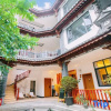 Отель Dali Hepu Log Home Inn, фото 21