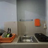 Отель Simply And Clean Studio At Vida View Makassar Apartment, фото 11