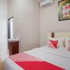 Отель OYO 3225 Alinia Guest House Syariah, фото 4