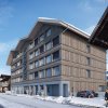 Отель Revier Mountain Lodge Adelboden в Адельбодене