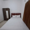 Отель OYO 94090 Prasetya Homestay, фото 8