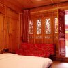 Отель Lijiang Xianyun Xiaozhu Inn, фото 5