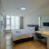 Отель Spacious Cozy and Relax 2BR at L'Avenue Apartment, фото 6