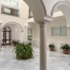 Отель Suites Sevilla Plaza Apartamentos в Севилье