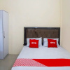 Отель OYO 90785 Mutiara Guest House, фото 21